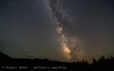 The Milky Way core over the mountains and trees at Applegate Lake, Oregon