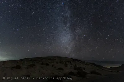 Milky Way and the Andromeda Galaxy over a sand dune at Knolls Recreation Area, Utah
